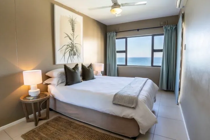 Main bedroom with a double bed and sea view